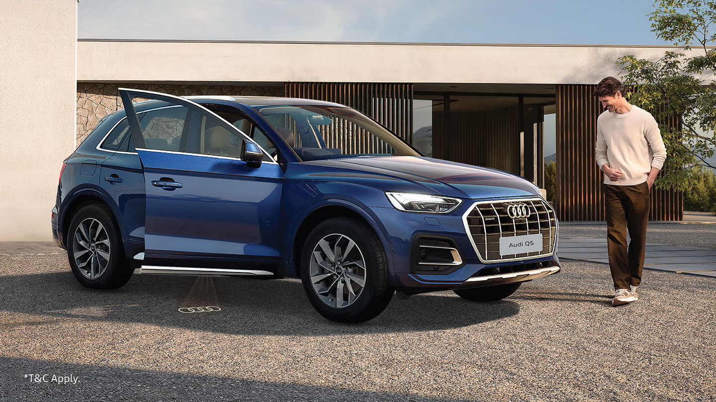 Audi Q5 outside a contemporary Audi showroom